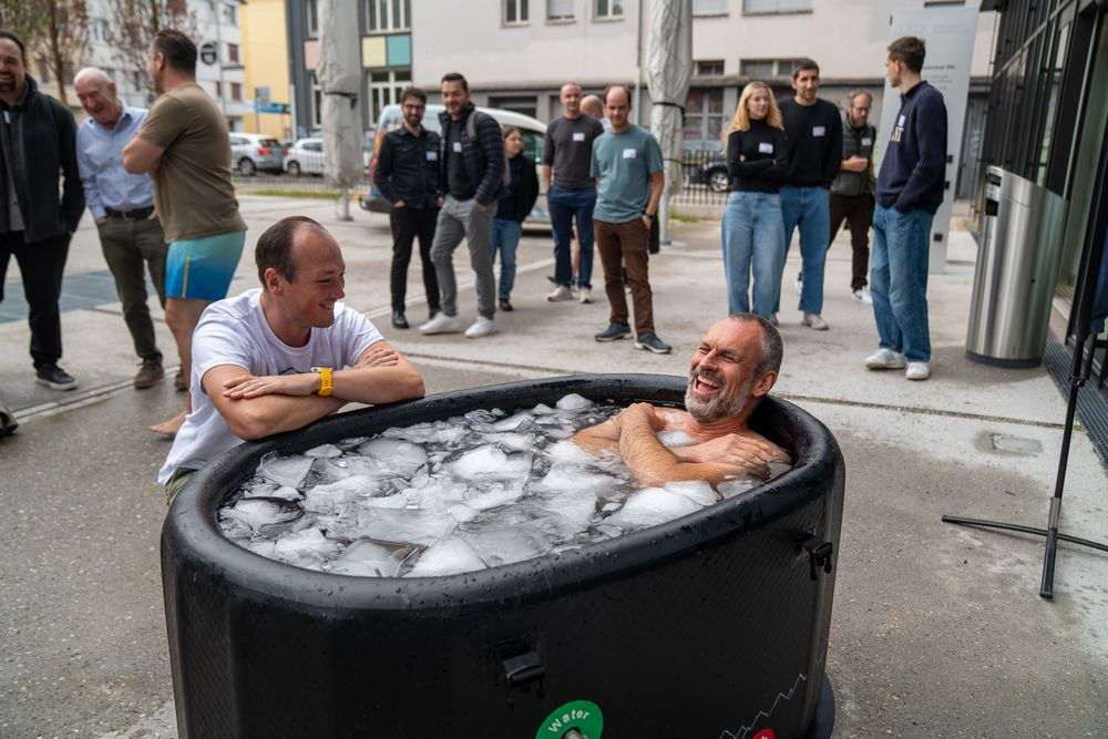 Ice bath outside the venue with spectators looking on