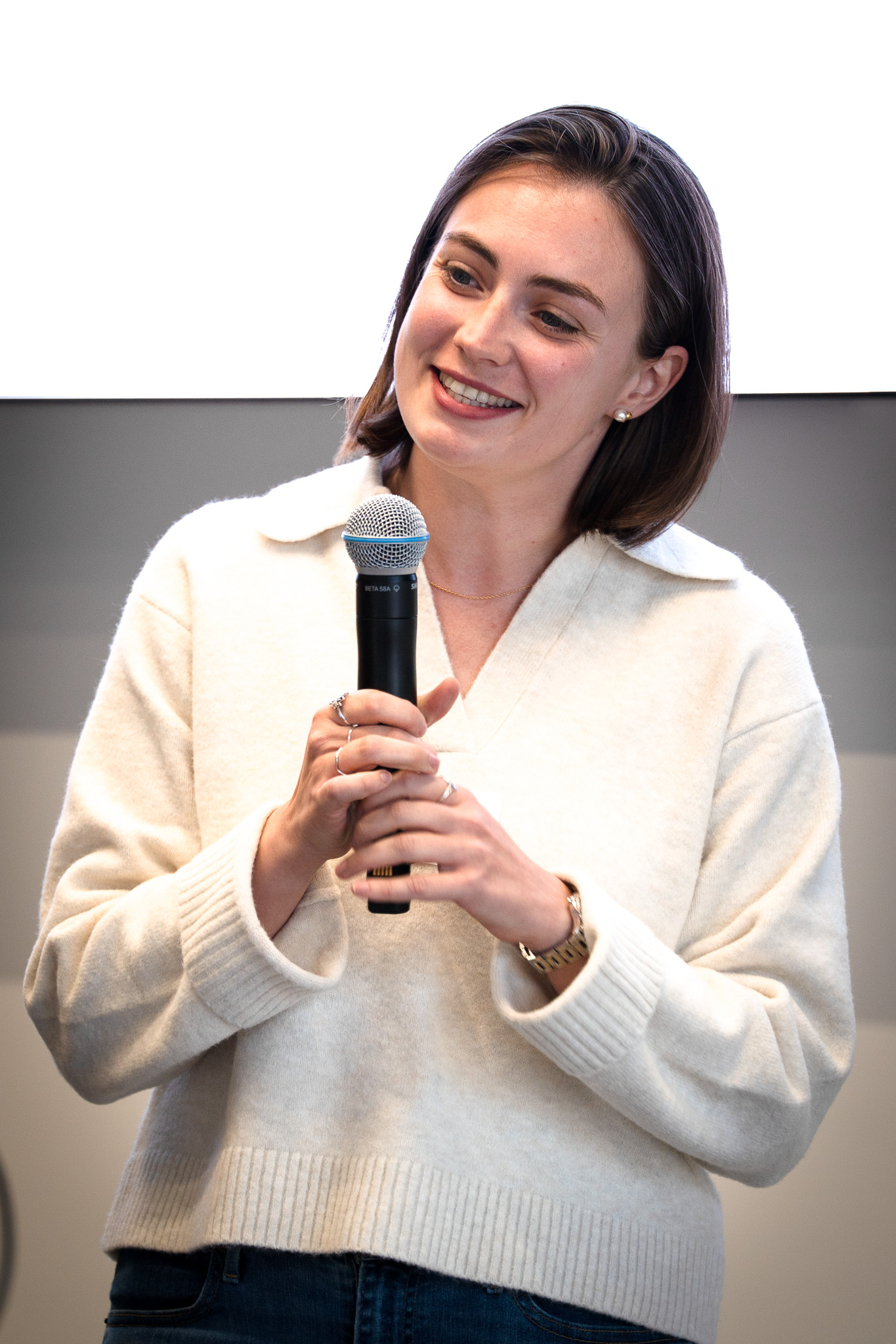 Speaker presenting on stage at Vibe Code Fest Basel 2026