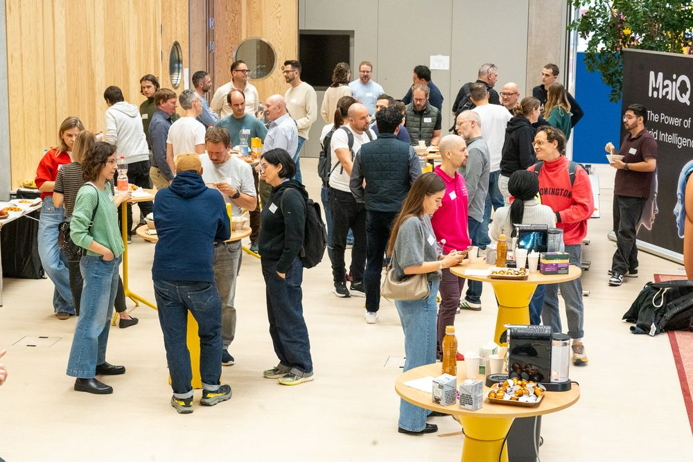 Participants networking at the break with coffee and snacks